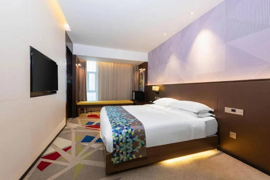 Bed in Borrman Hotel Wuhan Hankou Railway Station Metro Station