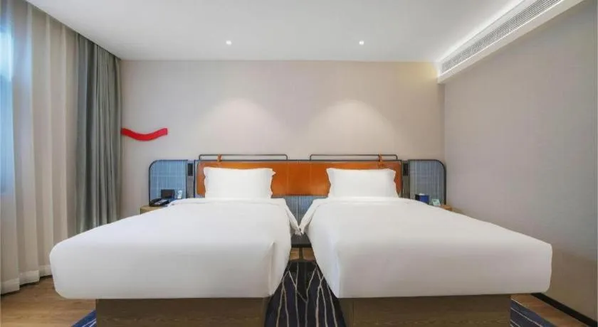 Bed in Echarm Hotel Nanjing Expo Center Olympic East Metro Station