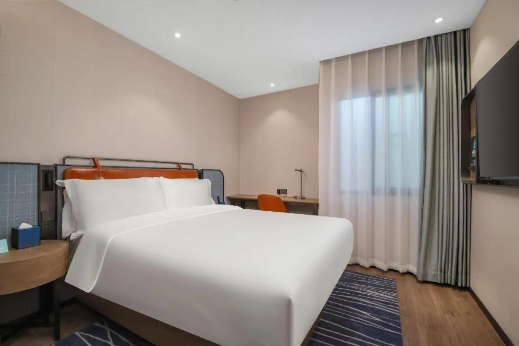 Bed in Echarm Hotel Nanjing Expo Center Olympic East Metro Station