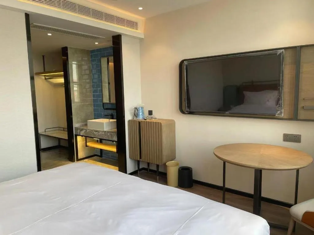 Bed in Echarm Hotel Nanjing Expo Center Olympic East Metro Station