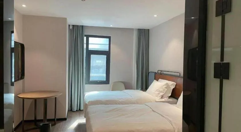 Bed in Echarm Hotel Nanjing Expo Center Olympic East Metro Station