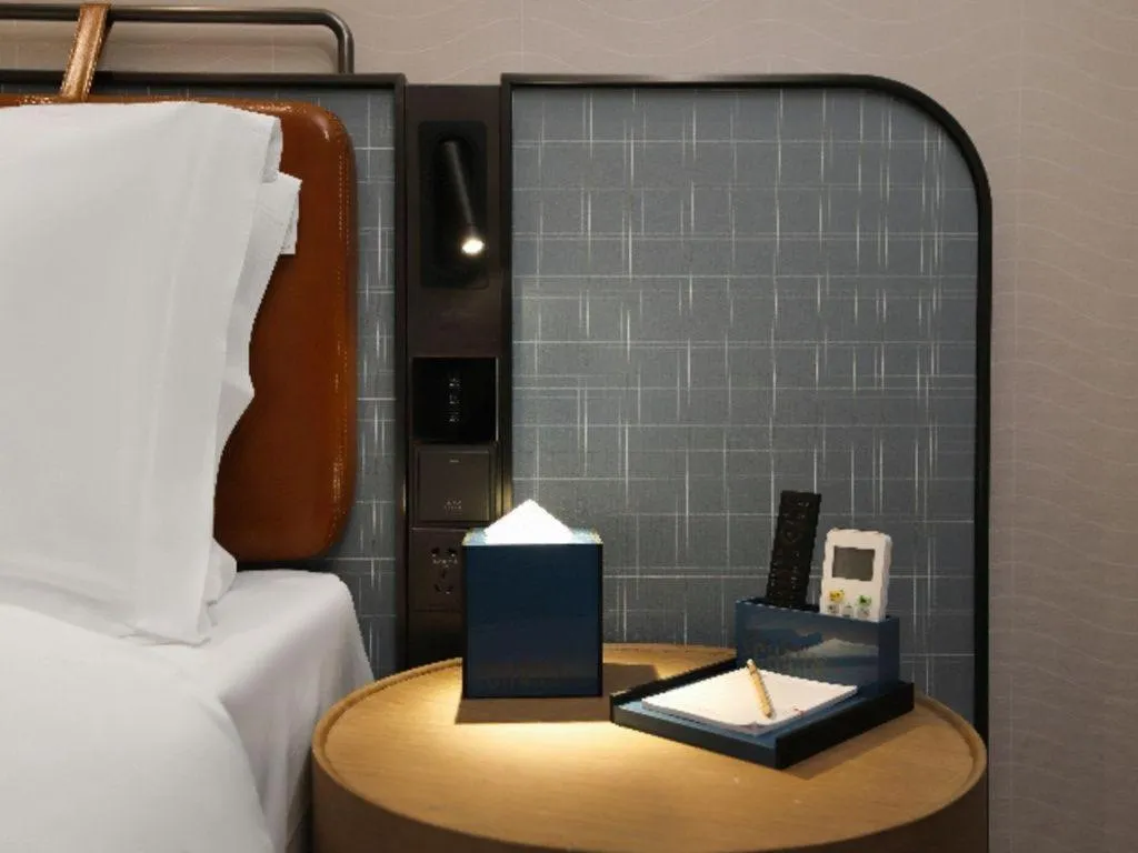 Bed in Echarm Hotel Nanjing Expo Center Olympic East Metro Station