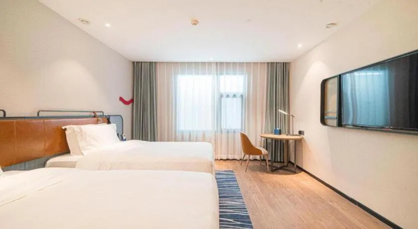 Bed in Echarm Hotel Nanjing Expo Center Olympic East Metro Station