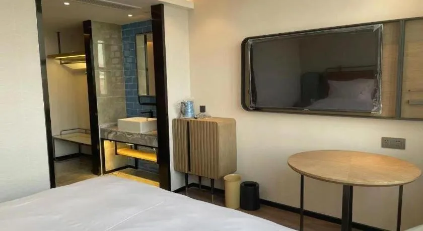 Bed in Echarm Hotel Nanjing Expo Center Olympic East Metro Station