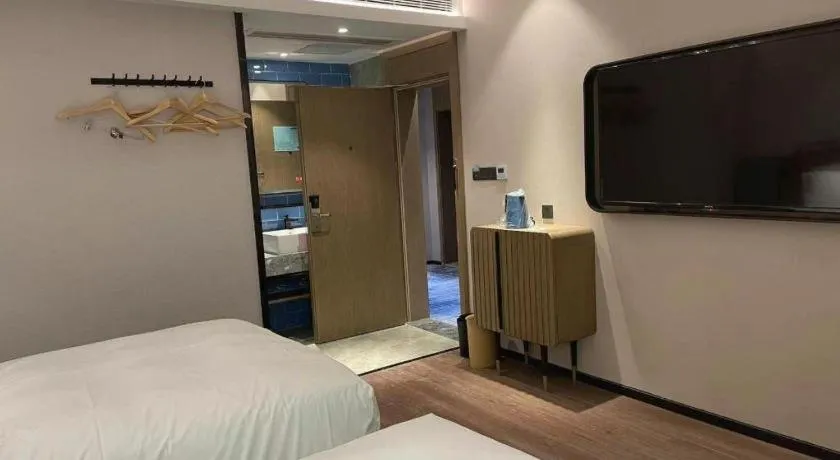 Bed in Echarm Hotel Nanjing Expo Center Olympic East Metro Station