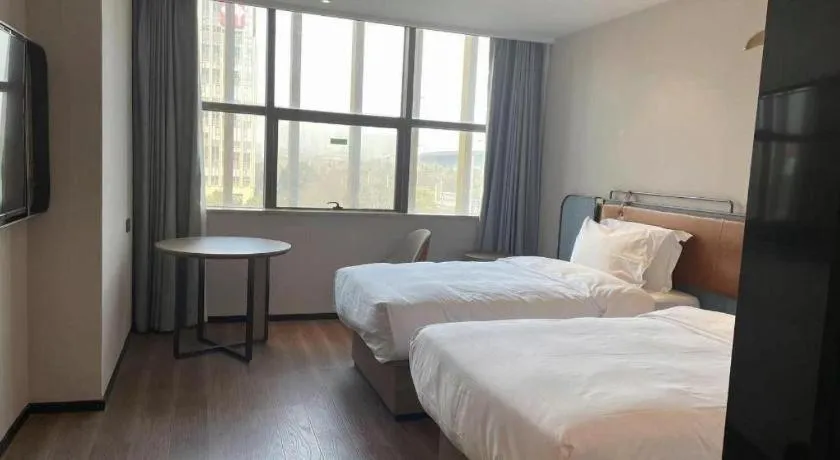 Bed in Echarm Hotel Nanjing Expo Center Olympic East Metro Station