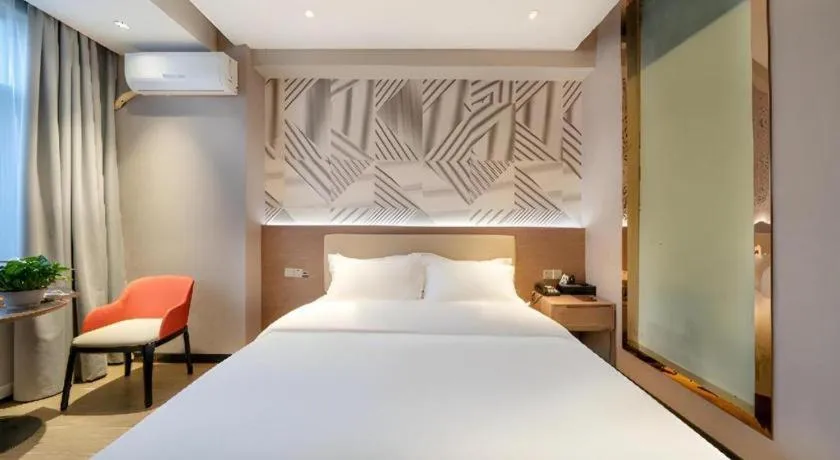 Bed in Borrman Hotel Xiantao Wushang Gymnasium