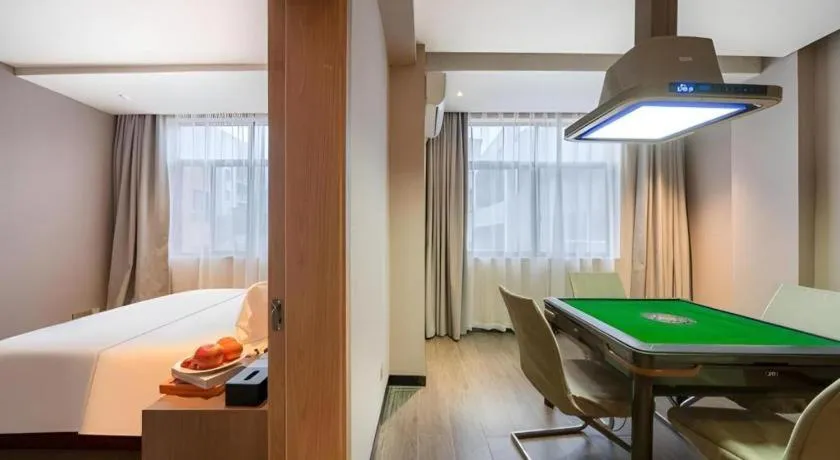 Bed in Borrman Hotel Xiantao Wushang Gymnasium