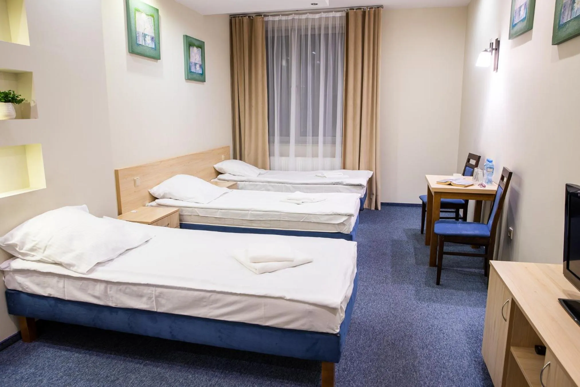 Bed in Hotel Kardamon