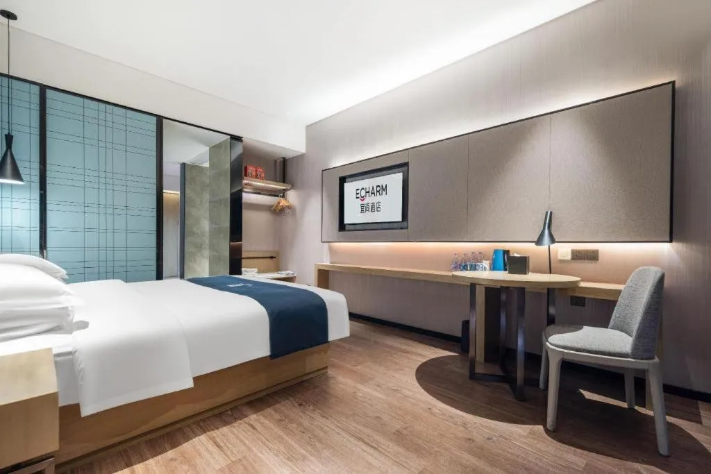 Bed in Echarm Hotel Wuhan Huashan