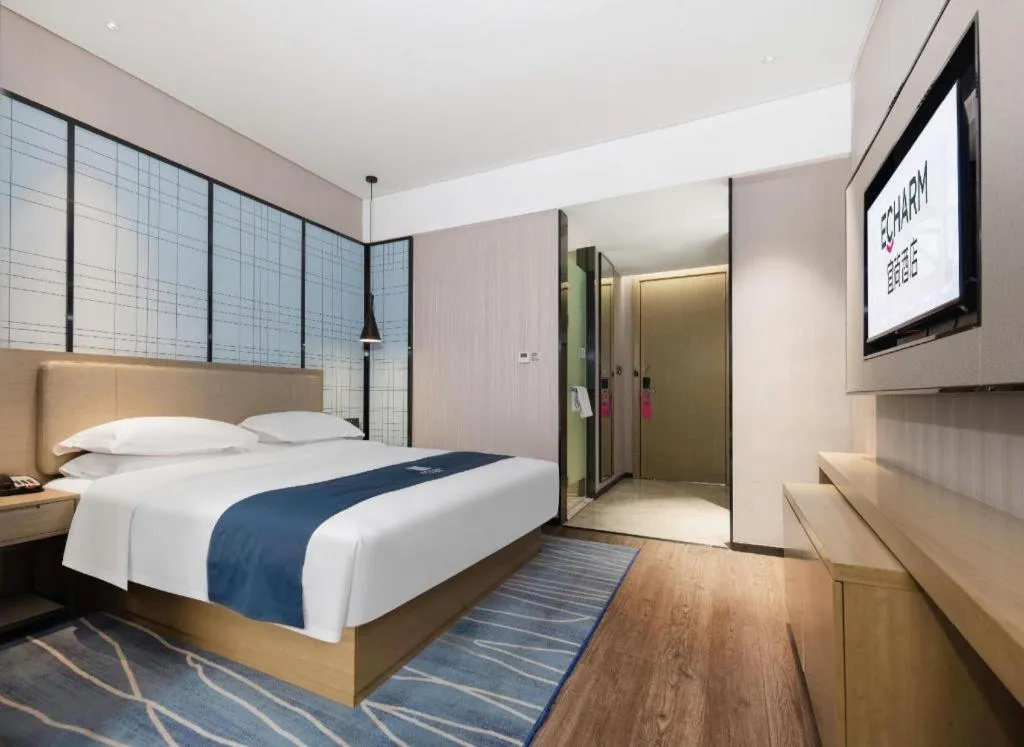 Bed in Echarm Hotel Wuhan Huashan