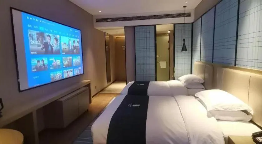 Bed in Echarm Hotel Wuhan Huashan