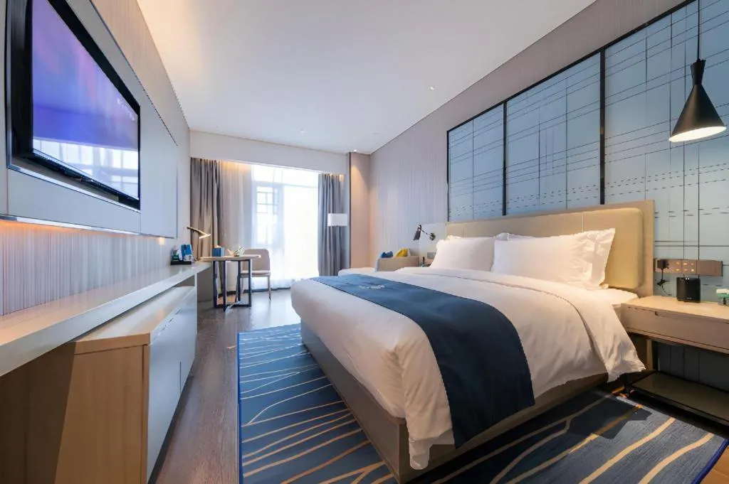 Bed in Echarm Hotel Wuhan Huashan