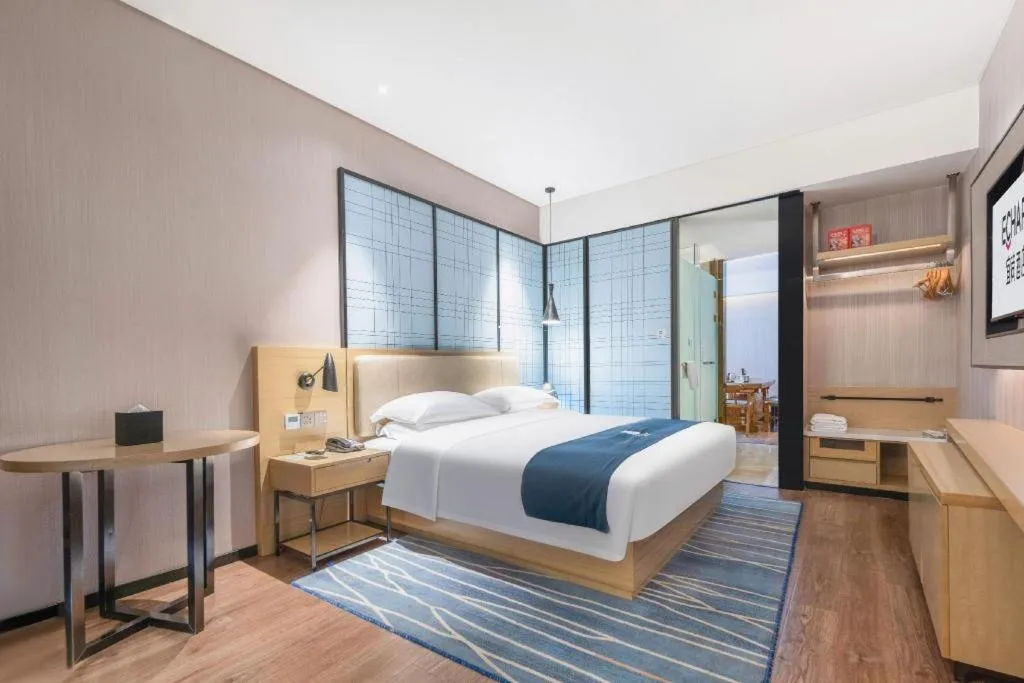 Bed in Echarm Hotel Wuhan Huashan