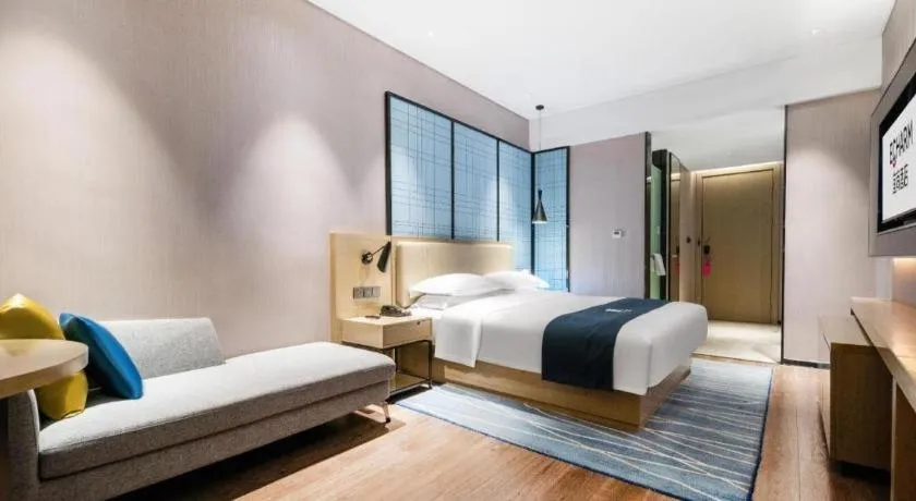 Bed in Echarm Hotel Wuhan Huashan