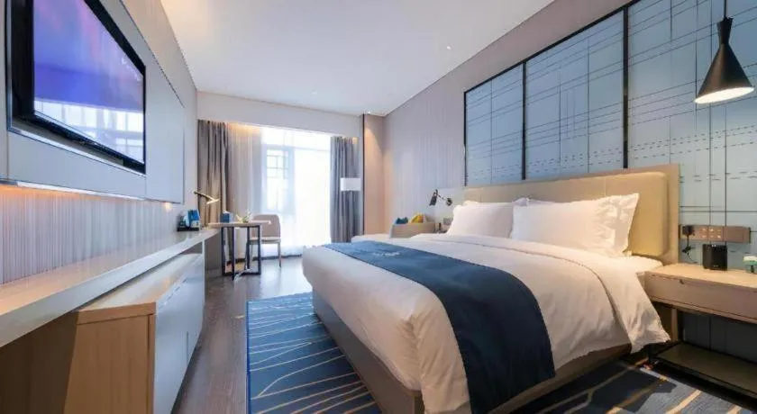 Bed in Echarm Hotel Wuhan Huashan