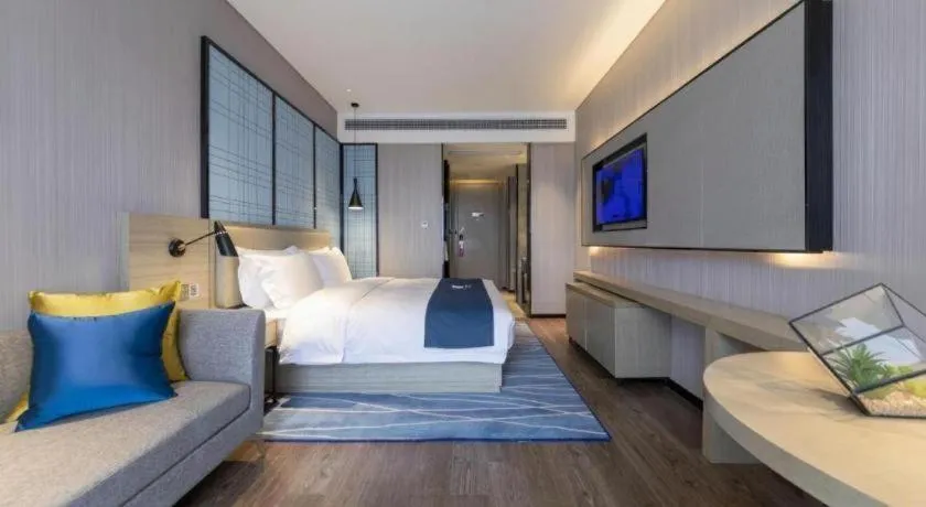 Bed in Echarm Hotel Wuhan Huashan