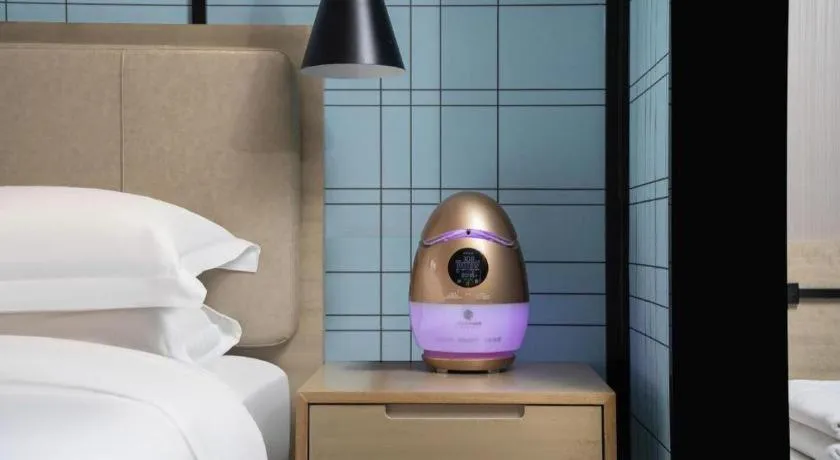 Bed in Echarm Hotel Wuhan Huashan