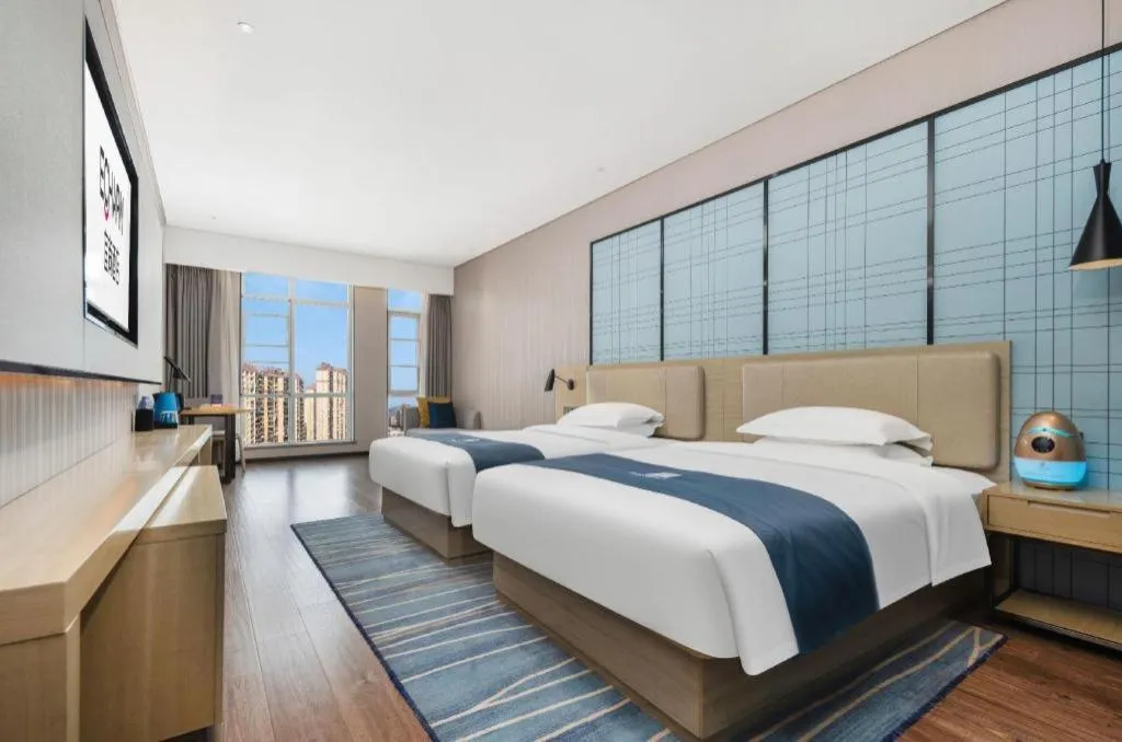 Bed in Echarm Hotel Wuhan Huashan