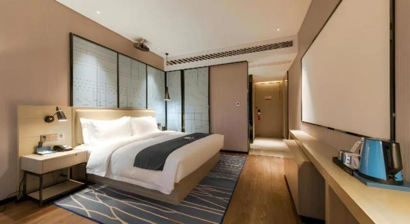 Bed in Echarm Hotel Wuhan Huashan