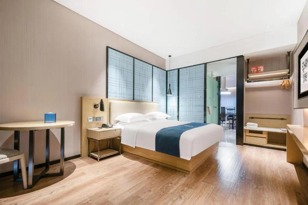 Bed in Echarm Hotel Wuhan Huashan