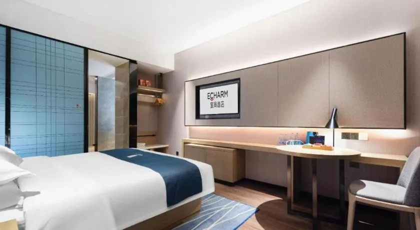 Bed in Echarm Hotel Wuhan Huashan