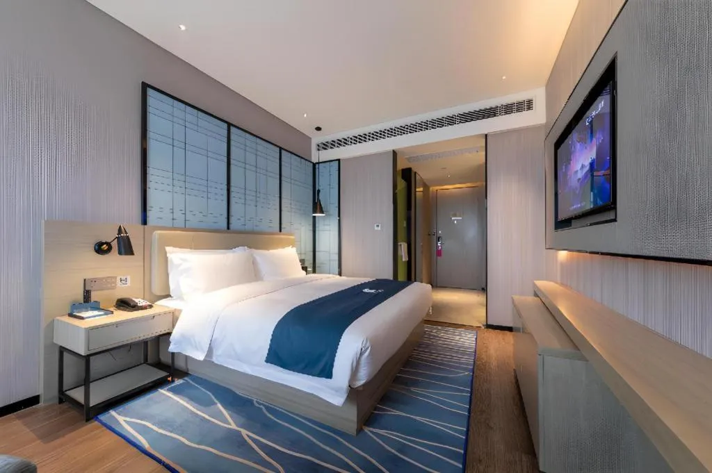 Bed in Echarm Hotel Wuhan Huashan