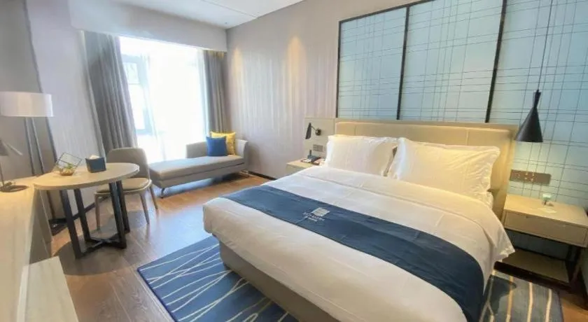 Bed in Echarm Hotel Wuhan Huashan