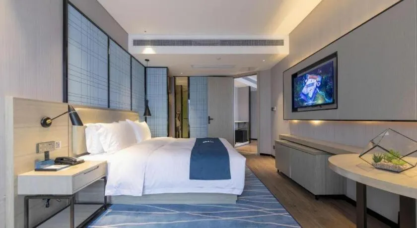 Bed in Echarm Hotel Wuhan Huashan