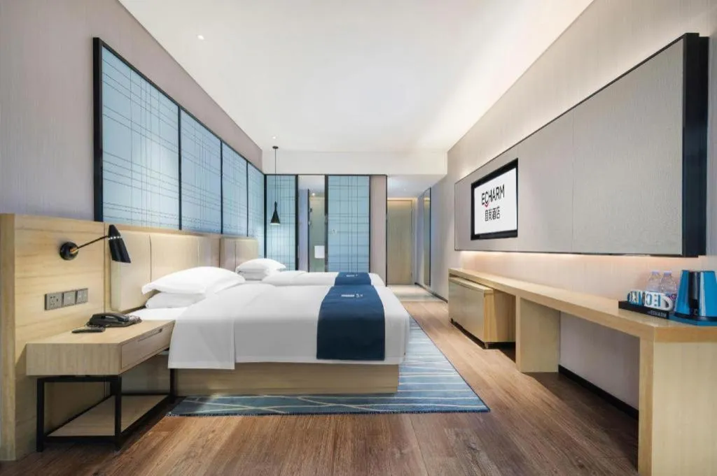 Bed in Echarm Hotel Wuhan Huashan