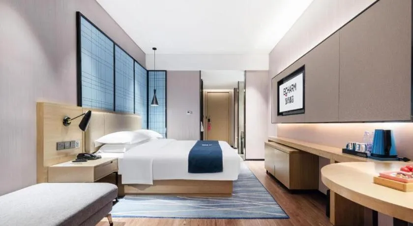 Bed in Echarm Hotel Wuhan Huashan