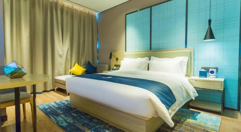 Bed in Echarm Hotel Wuhan Huashan
