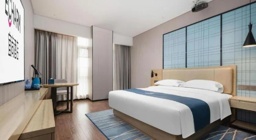 Bed in Echarm Hotel Wuhan Huashan