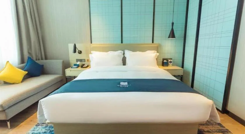 Bed in Echarm Hotel Wuhan Huashan