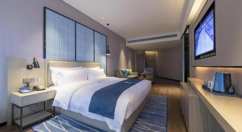 Bed in Echarm Hotel Wuhan Huashan