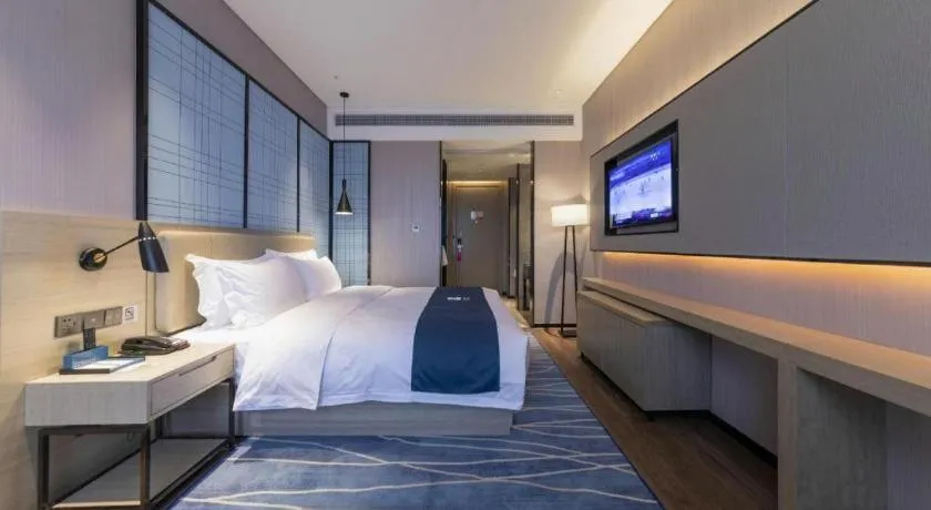 Bed in Echarm Hotel Wuhan Huashan