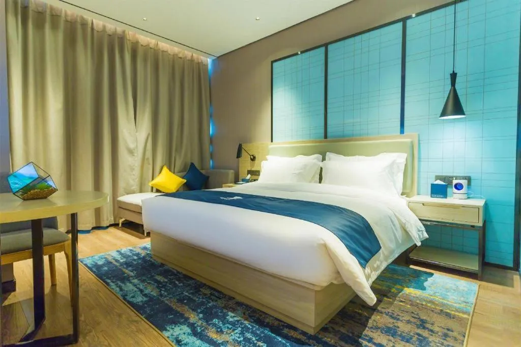 Bed in Echarm Hotel Wuhan Huashan