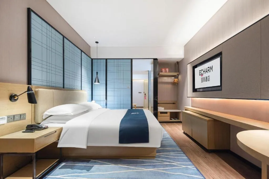 Bed in Echarm Hotel Wuhan Huashan