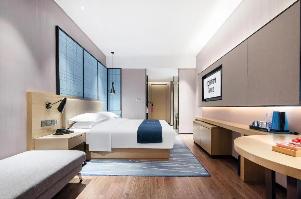 Bed in Echarm Hotel Wuhan Huashan