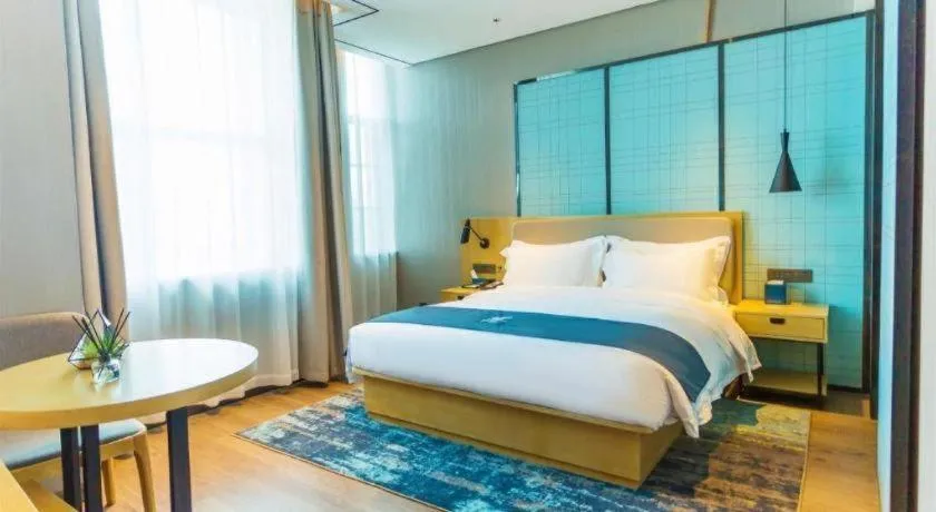 Bed in Echarm Hotel Wuhan Huashan