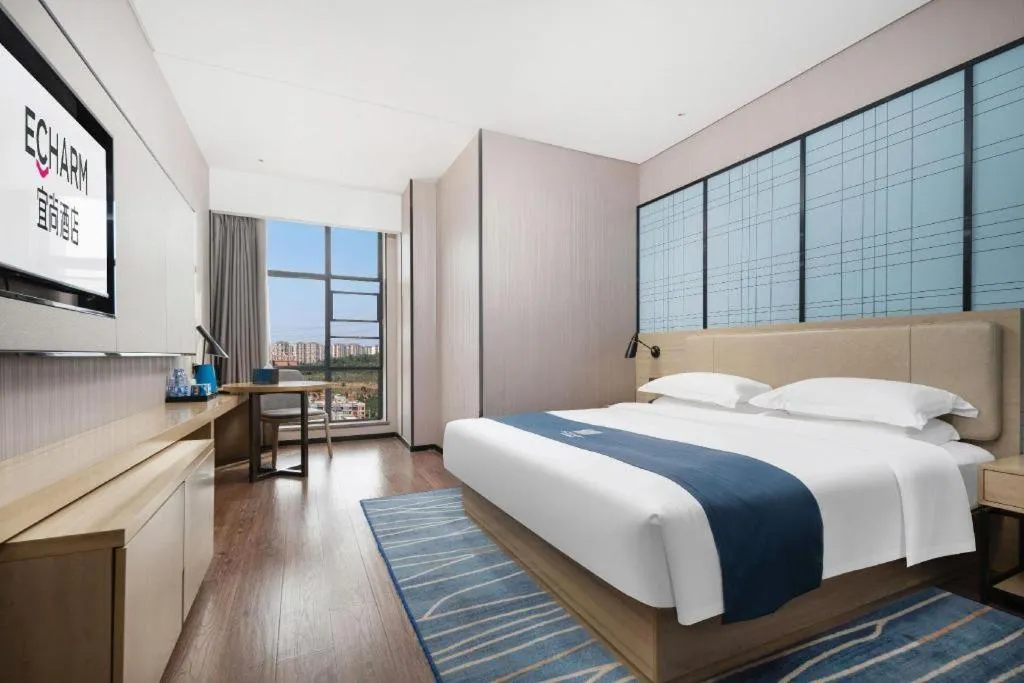 Bed in Echarm Hotel Wuhan Huashan