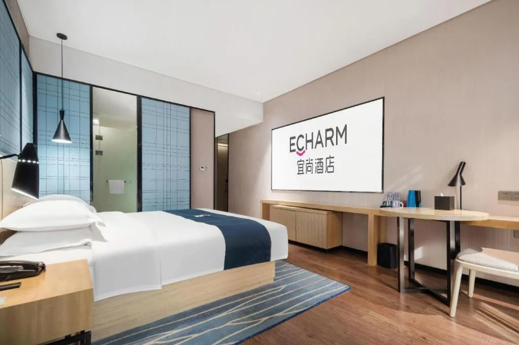 Bed in Echarm Hotel Wuhan Huashan