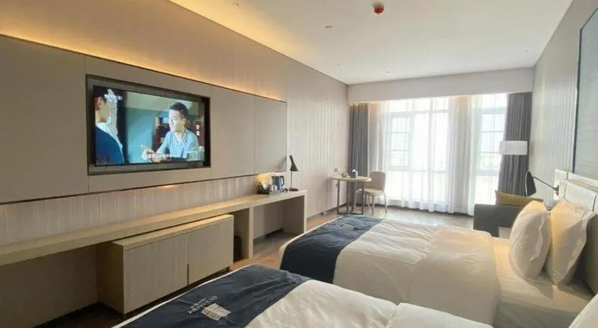 Bed in Echarm Hotel Wuhan Huashan