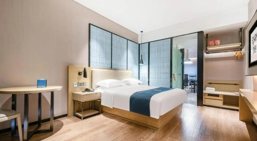 Bed in Echarm Hotel Wuhan Huashan