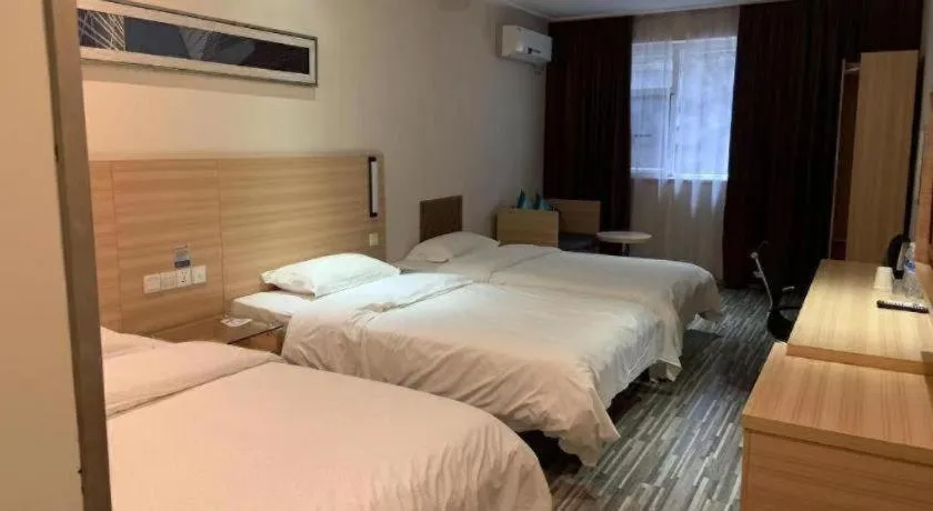 Bed in City Comfort Inn Yichang Wanda Plaza Yunhe Park