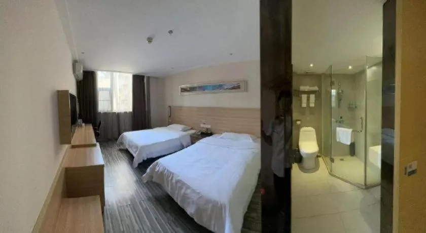 Bed in City Comfort Inn Yichang Wanda Plaza Yunhe Park