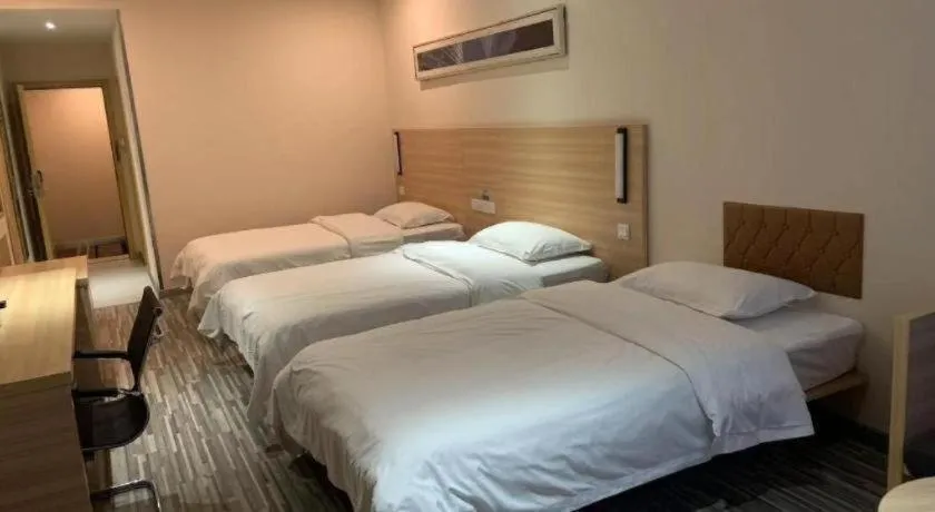 Bed in City Comfort Inn Yichang Wanda Plaza Yunhe Park