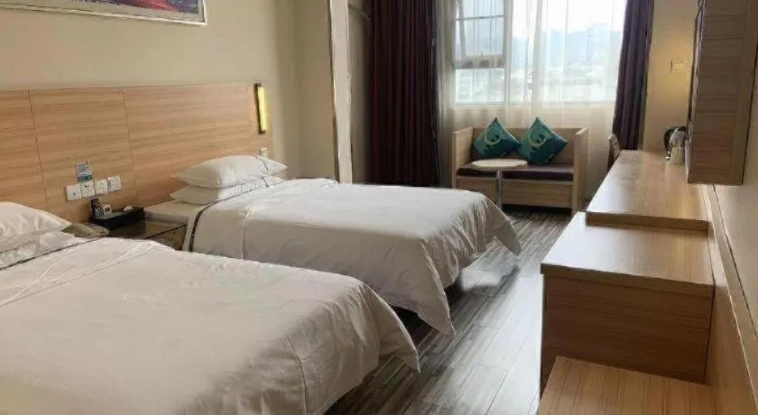 Bed in City Comfort Inn Yichang Wanda Plaza Yunhe Park