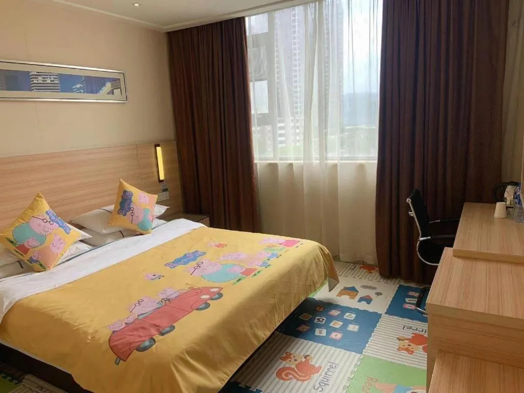 Bed in City Comfort Inn Yichang Wanda Plaza Yunhe Park