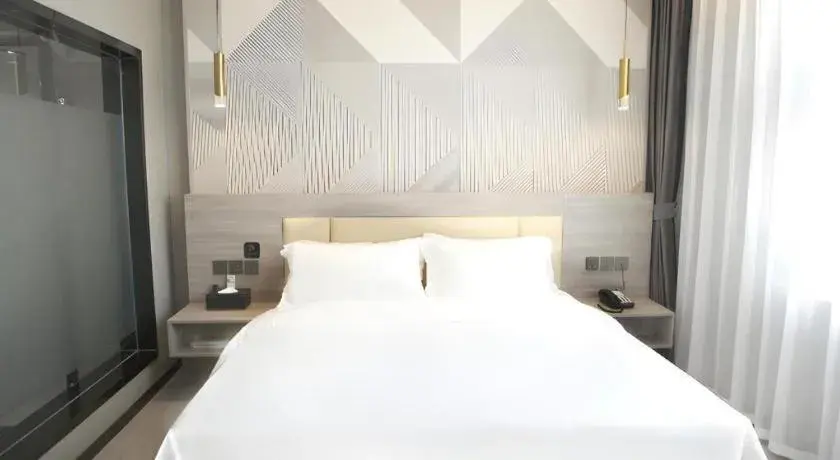 Bed in Borrman Hotel Pingyi Beifang Shicaicheng Mingde Road Bed in Borrman Hotel Pingyi Beifang Shicaicheng Mingde Road